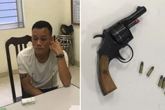 Mang súng đi đòi nợ giữa ban ngày, Tám bị lực lượng Cảnh sát cơ động tóm gọn. (Nguồn: Cơ quan chức năng cung cấp)