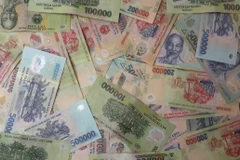 Đánh vào sự cả tin, hám lợi của nạn nhân, Lâm đăng thông tin đổi tiền giả với giá hời, lừa khách hàng gửi tiền rồi cắt liên lạc (Ảnh minh họa: Võ Phương/Vietnam+)