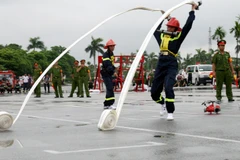 Sự phối hợp nhịp nhàng, ăn ý giữa các thành viên trong đội rất quan trọng. (Ảnh: Doãn Đức/Vietnam+)