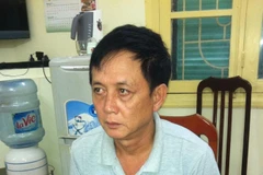 Đối tượng Lê Hoàng Anh tại cơ quan điều tra. (Ảnh: Cơ quan chức năng cung cấp)