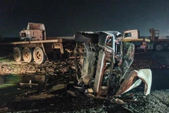 Hiện trường một vụ đánh bom xe tại Aden, Yemen, ngày 23/3. (Ảnh: AFP/ TTXVN)