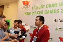 Xạ thủ Hoàng Xuân Vinh - niềm hy vọng của thể thao Việt Nam tại SEA Games 29. (Ảnh: Quốc Khánh/TTXVN)