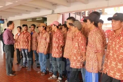Ngư dân Việt Nam được Indonesia trao trả. (Ảnh: Đỗ Quyên/Vietnam+)