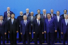 Đại diện các nước chụp ảnh tại hội nghị. (Ảnh: EPA/TTXVN)