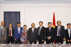 Thủ tướng Nguyễn Xuân Phúc với các đại biểu. (Ảnh: Thống Nhất/TTXVN)