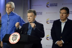 Tổng thống Colombia Juan Manuel Santos - giữa. (Ảnh: EPA/TTXVN)