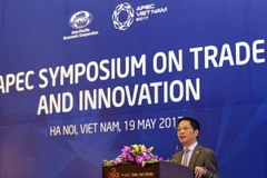 Bộ trưởng Công Thương Trần Tuấn Anh phát biểu khai mạc hội thảo. (Ảnh: Trần Việt/TTXVN )