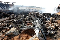 Hiện trường vụ đánh bom ở phía nam thủ đô Baghdad ngày 30/3 vừa qua. (Ảnh: EPA/TTXVN)