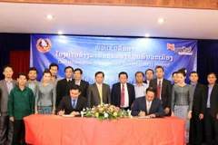 Quang cảnh lễ ký. (Ảnh: Phạm Kiên/Vietnam+)