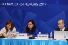 Thành viên nhóm điều hành cuộc họp. (Ảnh: Doãn Tấn/TTXVN)