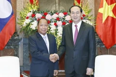 Chủ tịch nước Trần Đại Quang tiếp Trung tướng Somkeo Silavong, Bí thư Trung ương Đảng Nhân nhân Cách mạng Lào, Bộ trưởng Bộ An ninh Lào. (Ảnh: Nhan Sáng/TTXVN)