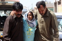 Người bị thương trong vụ sát hại. (Nguồn: EPA/TTXVN) 