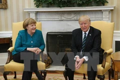 Tổng thống Mỹ Donald Trump và Thủ tướng Đức Angela Merkel. (Ảnh: EPA/TTXVN)