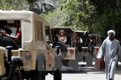 Cảnh sát Ai Cập tăng cường an ninh tại thủ đô Cairo. (Nguồn: AFP/TTXVN)