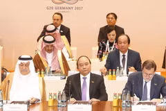 Thủ tướng Nguyễn Xuân Phúc dự phiên họp thứ 3 về chủ đề Quan hệ đối tác với châu Phi, Di cư và Y tế tại Hội nghị G-20. (Ảnh: Thống Nhất/TTXVN)