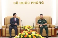 Đại tướng Phan Văn Giang và Ngài Kim Seon Ho tại buổi tiếp. (Ảnh: Hồng Pha/TTXVN phát)