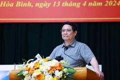 Thủ tướng Phạm Minh Chính phát biểu tại cuộc làm việc với Ban Thường vụ Tỉnh ủy Hòa Bình. (Ảnh: Dương Giang/TTXVN)