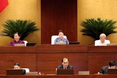 Chủ tịch Quốc hội Nguyễn Thị Kim Ngân và các Phó Chủ tịch Quốc hội điều hành phiên họp. (Ảnh: Trọng Đức/TTXVN)