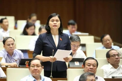 Đại biểu Quốc hội tỉnh Tuyên Quang Ma Thị Thuý phát biểu ý kiến. (Ảnh: Doãn Tấn/TTXVN)