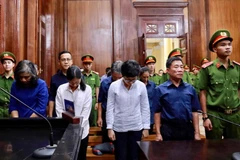 Các bị cáo nghe tuyên án ngày 22/11/2019. (Ảnh: Thành Chung/TTXVN)