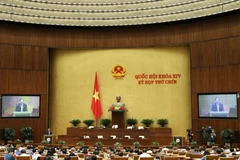 Chủ nhiệm Ủy ban Khoa học, Công nghệ và Môi trường của Quốc hội Phan Xuân Dũng trình bày Báo cáo giải trình, tiếp thu, chỉnh lý dự án Luật sửa đổi, bổ sung một số điều của Luật Xây dựng. (Ảnh: Văn Điệp/TTXVN)