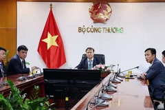 Thứ trưởng Đỗ Thắng Hải tham dự trực tuyến Lễ khai mạc Hội chợ Xuất nhập khẩu Trung Quốc lần thứ 130 và Diễn đàn thương mại quốc tế Châu Giang 2021. (Ảnh: Đức Duy/vietnam+)