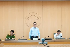 Phó Chủ tịch Ủy ban nhân dân thành phố Hà Nội Chử Xuân Dũng, chủ trì cuộc họp của Ban chỉ đạo phòng chống dịch bệnh COVID-19. (Ảnh: PV/Vietnam+)