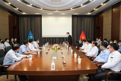 Bộ trưởng Bộ Công Thương Nguyễn Hồng Diên làm việc với An Phát Holdings về tăng trưởng xanh. (Ảnh: PV/Vietnam+)