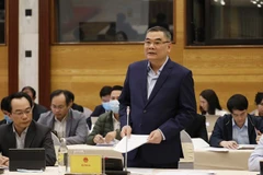 Ông Tô Ân Xô, Chánh văn phòng, Người Phát ngôn Bộ Công an trả lời làm rõ một số nội dung các phóng viên nêu. (Ảnh: TTXVN)