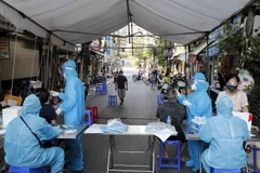 Sở Thông tin và Truyền thông bác tin Hà Nội chuẩn bị nới lỏng các biện pháp phòng dịch được lan truyền trên mạng xã hội. (Ảnh: PV/Vietnam+)