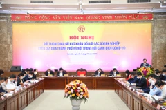 Bí thư Thành ủy Hà Nội phát biểu tại hội nghị: Đối thoại tháo gỡ khó khăn đối với các doanh nghiệp trên địa bàn thành phố. (Ảnh: PV/Vietnam+)