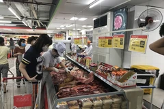 Bộ Công Thương đề nghị doanh nghiệp chuẩn bị lượng hàng hóa thiết yếu theo mức độ cao nhất của dịch COVID-19. (Ảnh: Đức Duy/Vietnam+)