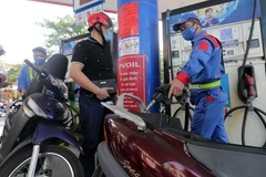 Một điểm kinh doanh xăng dầu của PVOIL tại Hà Nội. (Ảnh: TTXVN)