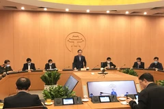 Phó Chủ tịch Ủy ban nhân dân thành phố Hà Nội Chử Xuân Dũng, chủ trì cuộc họp của Ban chỉ đạo phòng chống dịch bệnh COVID-19 chiều 3/2. (Ảnh: Xuân Quảng/Vietnam+)