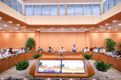 Cuộc họp của Ban Chỉ đạo COVID-19 thành phố Hà Nội. (Ảnh: PV/Vietnam+)
