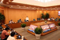Ông Chu Ngọc Anh, Chủ tịch Ủy ban Nhân dân thành phố Hà Nội chủ trì giao ban với các đơn vị. (Ảnh: PV/Vietnam+)