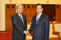 Thủ tướng Nguyễn Tấn Dũng tiếp Giám đốc Khu vực Tây Thái Bình Dương của Tổ chức Y tế Thế giới (WHO) Shin Young Soo. (Ảnh: Dương Giang/TTXVN)