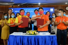 Đại diện FPT và Động Lực ký kết hợp tác chiến lược. (Ảnh: FPT)