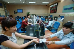 Giao dịch tại Baoviet Bank. (Nguồn: Baoviet Bank).