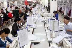 Sản xuất dệt may. (Nguồn: TTXVN).