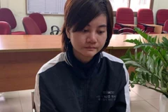 Đối tượng Hoàng Huệ Tâm tại cơ quan điều tra. (Nguồn: Nhandan.com.vn)