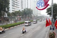 Đoàn xe đưa các biểu tới Trung tâm Hội nghị quốc gia. (Ảnh minh họa: TTXVN)