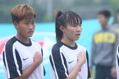 Lê Thị Thu (số 2) trong đội hình tuyển nữ Việt Nam dự vòng loại giải U19 châu Á 2014. (Ảnh: Minh Chiến/Vietnam+)