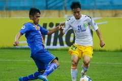 Hà Nội T&T (áo trắng) là đội bóng V-League hiếm hoi có thể đáp ứng điều kiện tài chính của ASL. (Ảnh: Minh Chiến/Vietnam+)