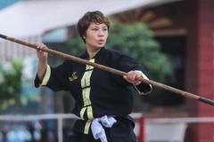 Chân dung Nguyễn Thị Thanh Tâm - võ sư cấp 18 của Liên đoàn võ thuật cổ truyền Việt Nam, trưởng môn sáng lập phái Uy Long. (Ảnh: Minh Chiến/Vietnam+)