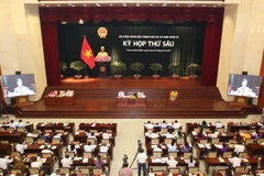 Quang cảnh Phiên chất vấn và trả lời chất vấn. (Ảnh: Thanh Vũ/TTXVN)