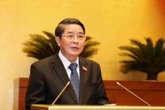 Chủ nhiệm Ủy ban Tài chính, Ngân sách của Quốc hội Nguyễn Đức Hải trình bày Báo cáo giải trình, tiếp thu, chỉnh lý dự án Luật Đầu tư công (sửa đổi). (Ảnh: Phương Hoa/TTXVN)