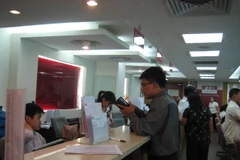 SSI tiếp tục dẫn đầu thị trường trong 6 tháng đầu của năm với 13,84% thị phần. (Ảnh: PV/Vietnam+)