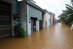 Những khu nhà ở phường Hòa Khánh Nam, quận Liên Chiểu bị ngập sâu trong nước. (Ảnh: Trần Lê Lâm/TTXVN)