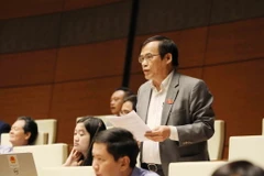 Đại biểu Quốc hội tỉnh Cao Bằng Phùng Văn Hùng phát biểu. (Ảnh: Phương Hoa/TTXVN)